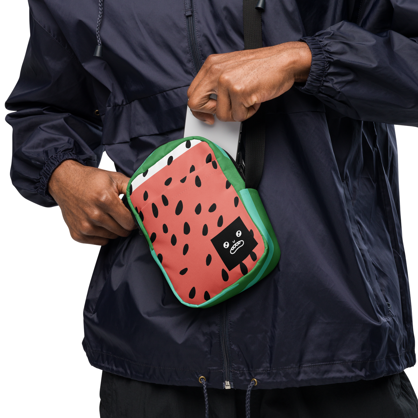 Mini crossbody bag with a watermelon print, black seed details, green edges, and a cartoon face on the front – fun and quirky design.
