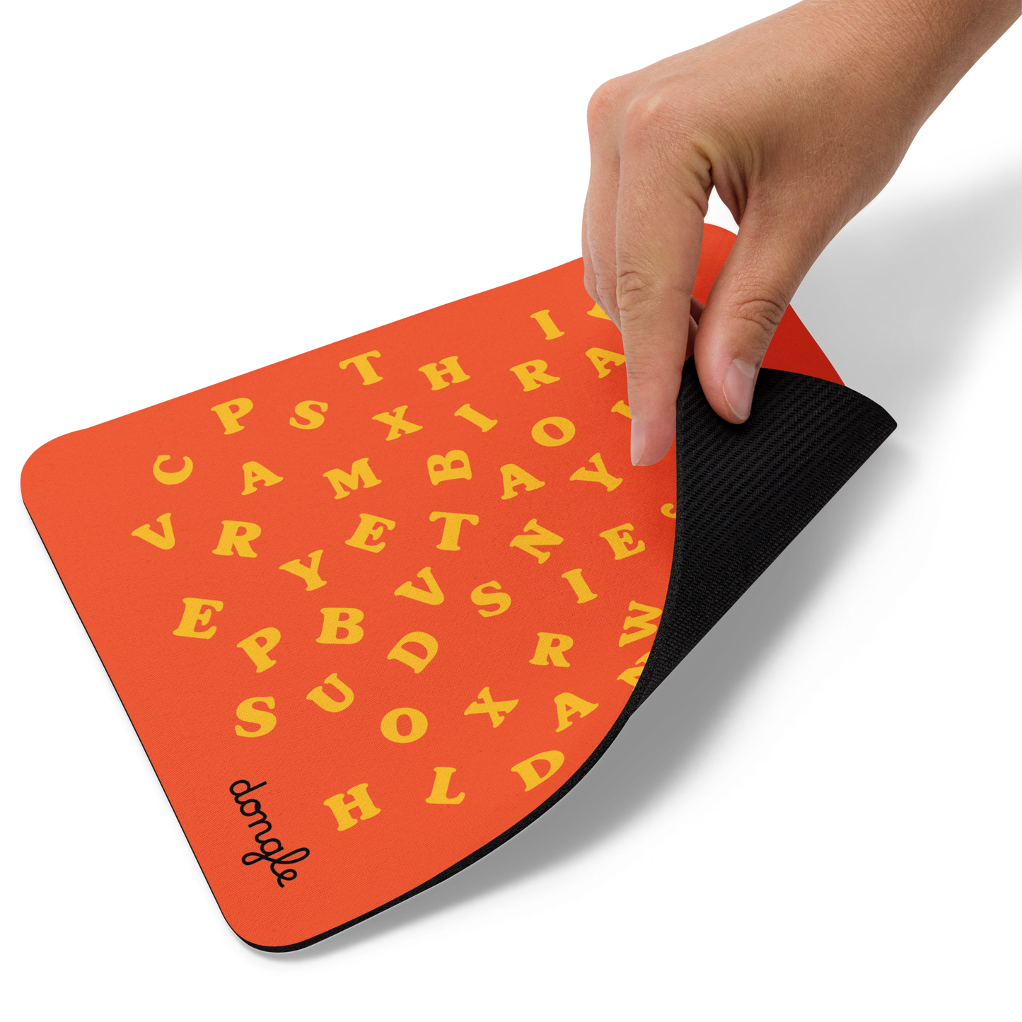 Orange mousepad with scattered yellow alphabet letters and a white wireless mouse on top, designed by Dongle