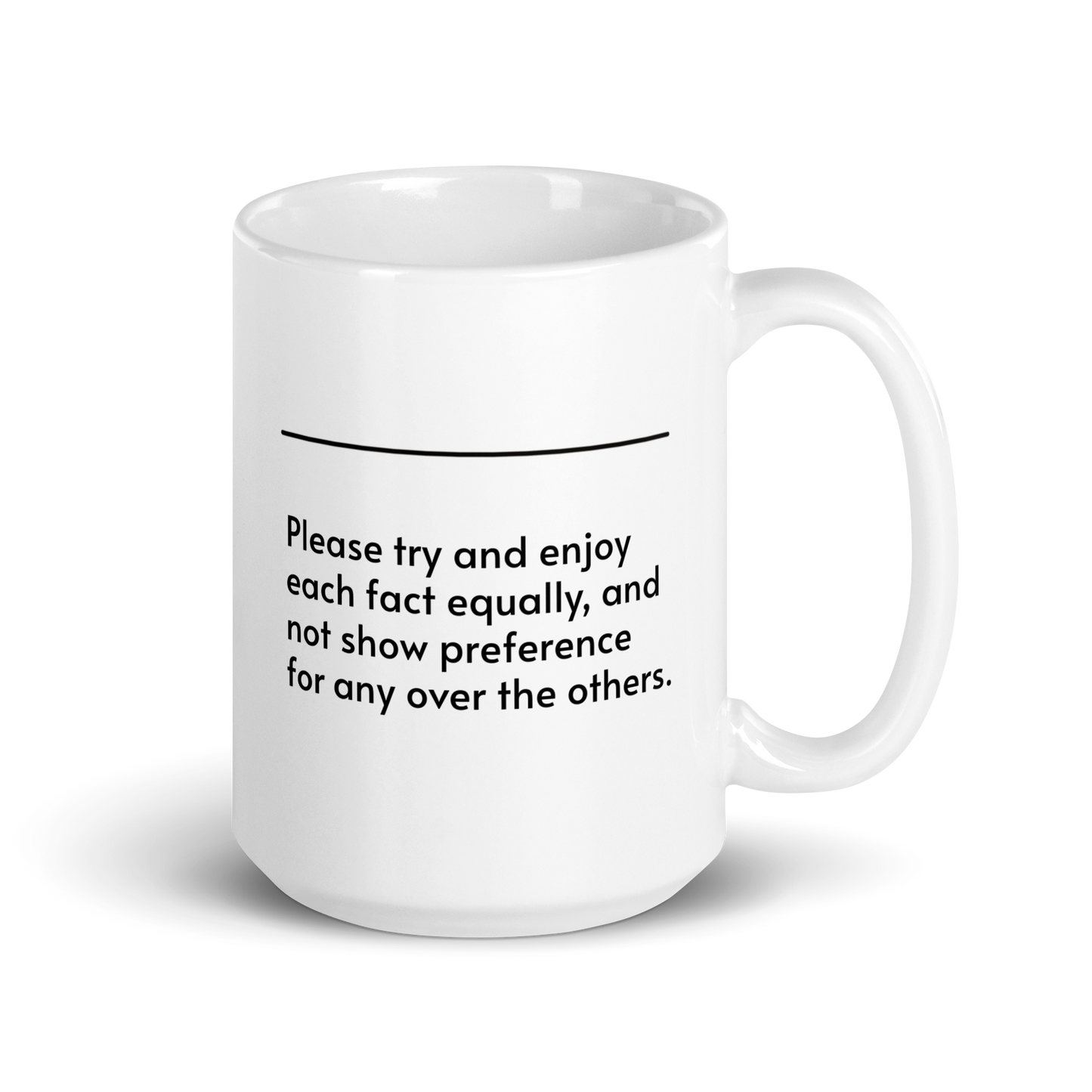 White ceramic mug with a humorous quote: "Please try and enjoy each fact equally, and not show preference for any over the others."