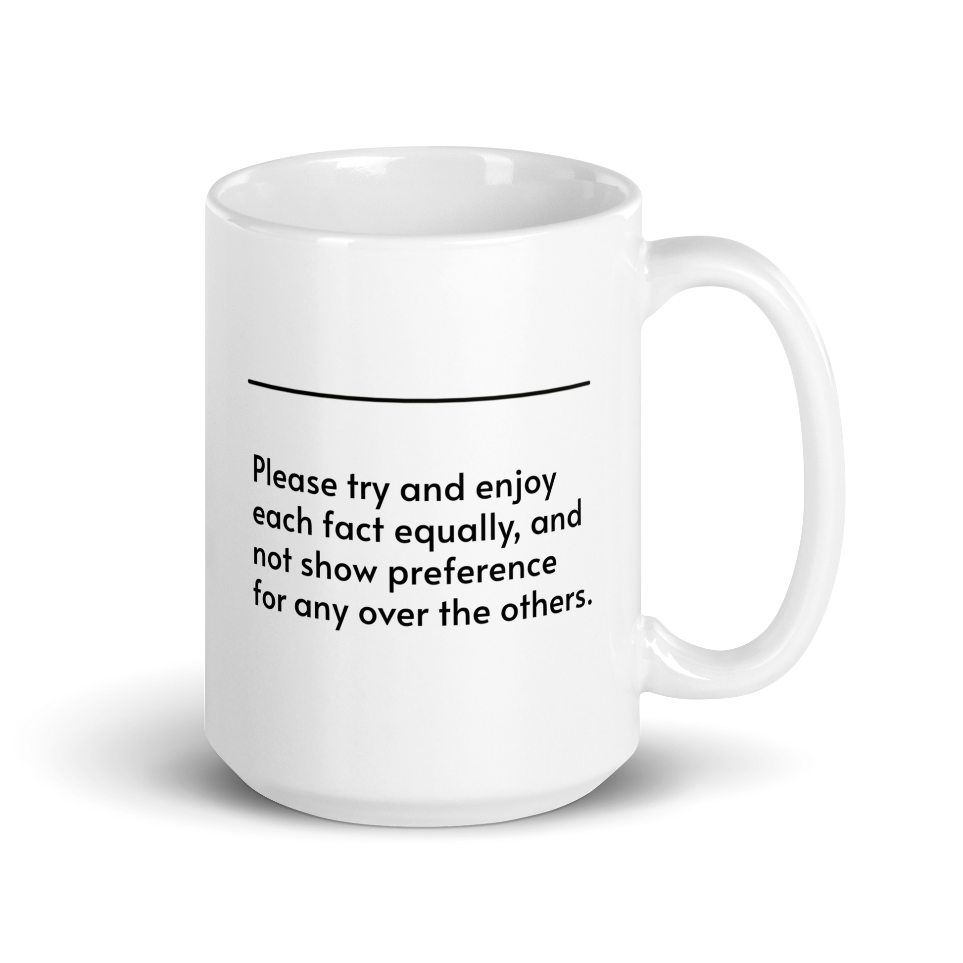 White ceramic mug with a humorous quote: "Please try and enjoy each fact equally, and not show preference for any over the others."